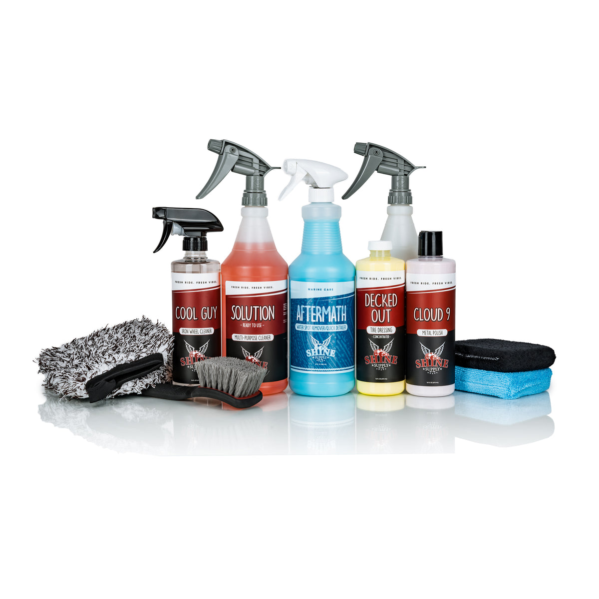 Shine Supply Chrome and Polished Aluminum Wheels Maintenance Kit with Cool Guy iron wheel cleaner, Solution all purpose cleaner, Aftermath water spot remover, Decked Out tire dressing, Cloud 9 metal polish, a Shine Supply wheel mitt, the Tire Tamer brush, and applicator pads
